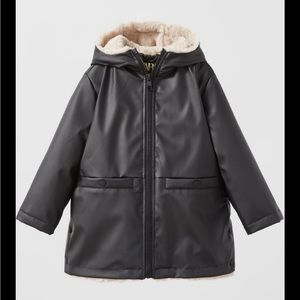 Faux fur rubberized raincoat